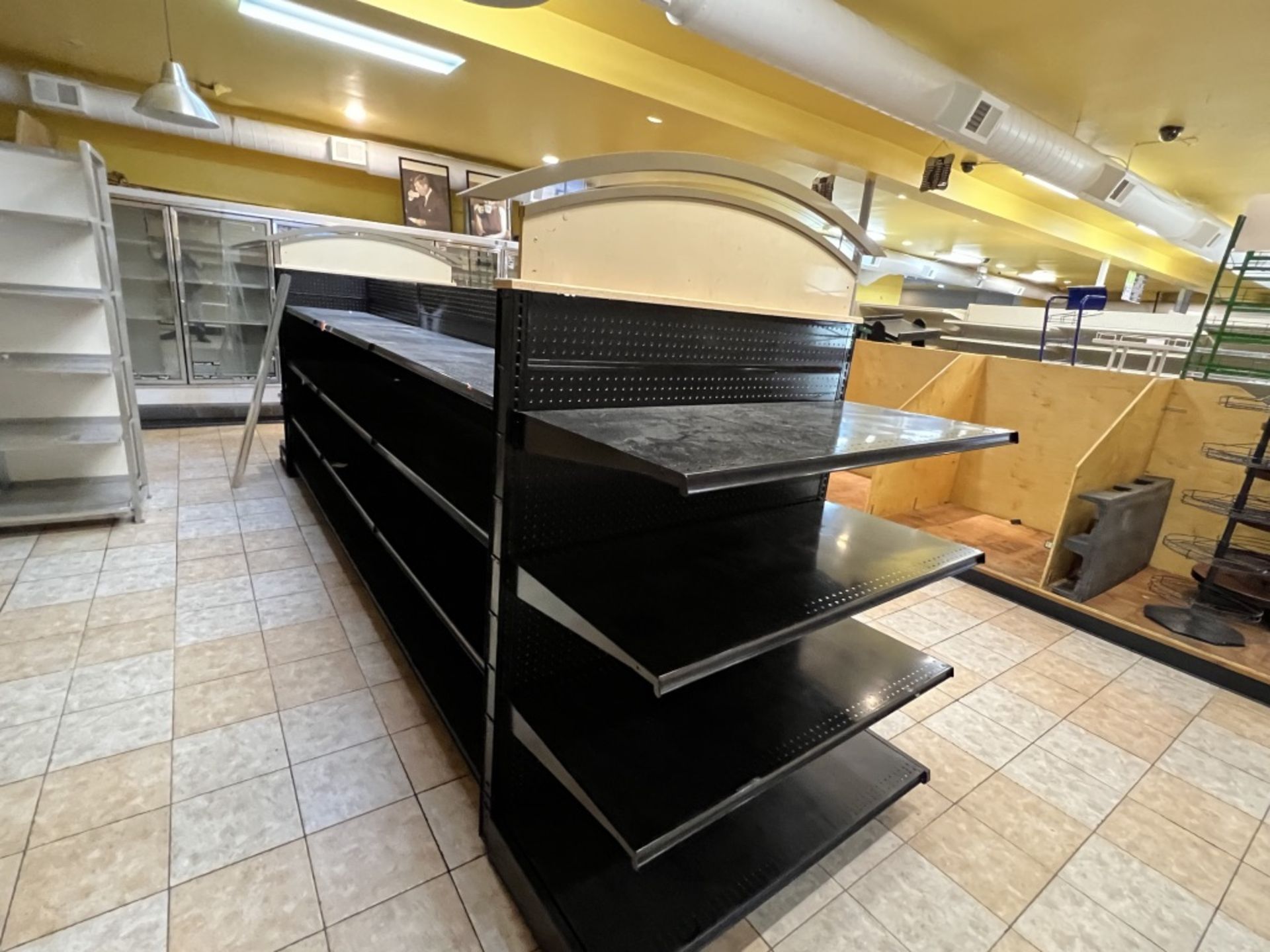 8 Section adjustable Gondola shelving system Approximately 195” Long X 50” Wide with 2 archways o - Image 7 of 12