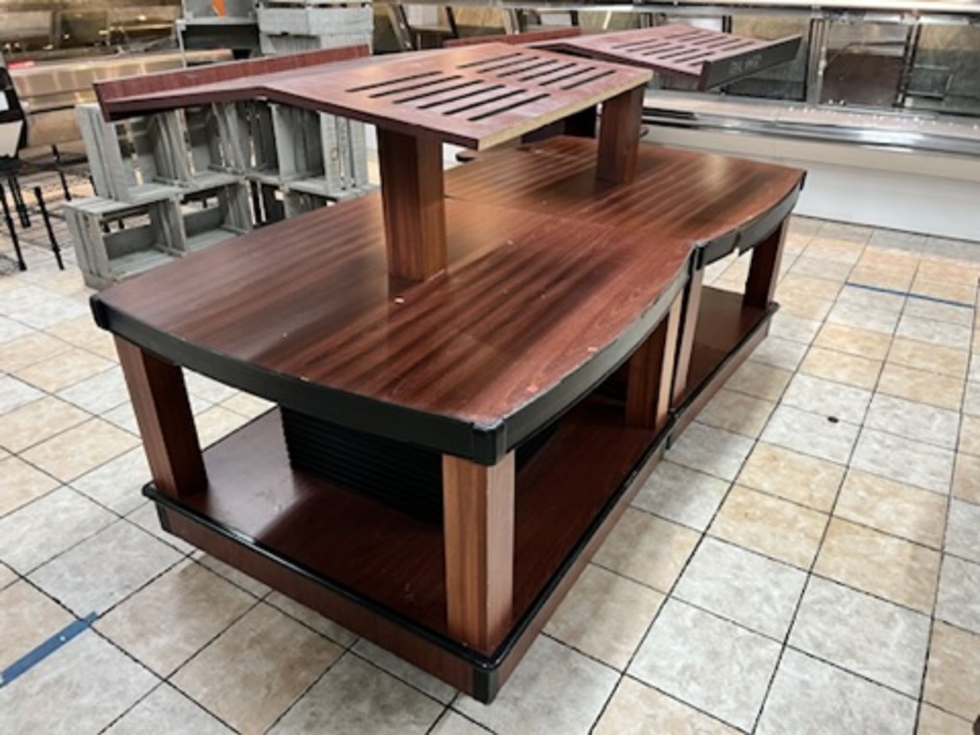 Lot of: (2) approximately 47” X 47” 2 tier wood laminate display tables w/ upper display shelving - Image 6 of 18