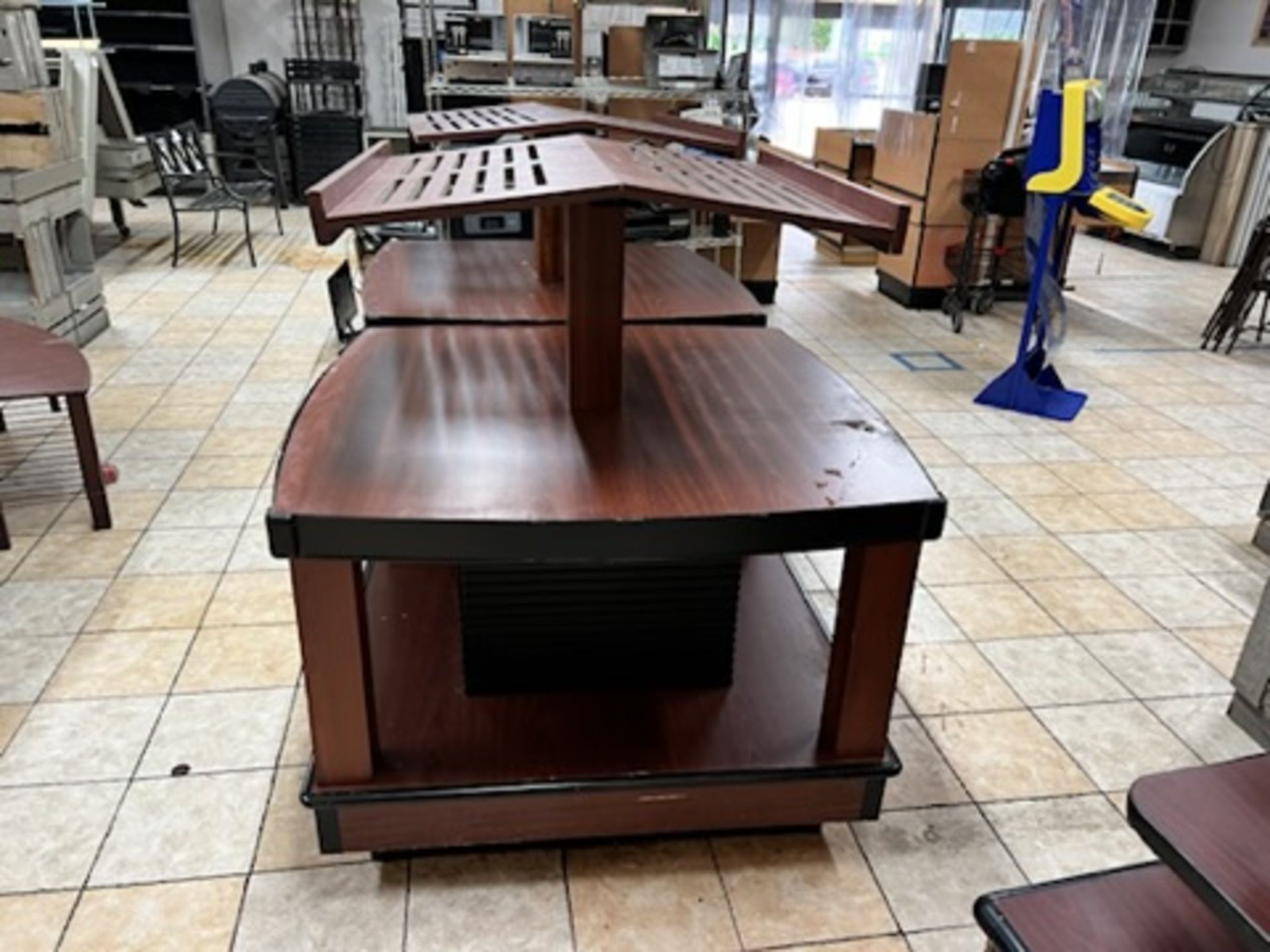 Lot of: (2) approximately 47” X 47” 2 tier wood laminate display tables w/ upper display shelving - Image 8 of 18