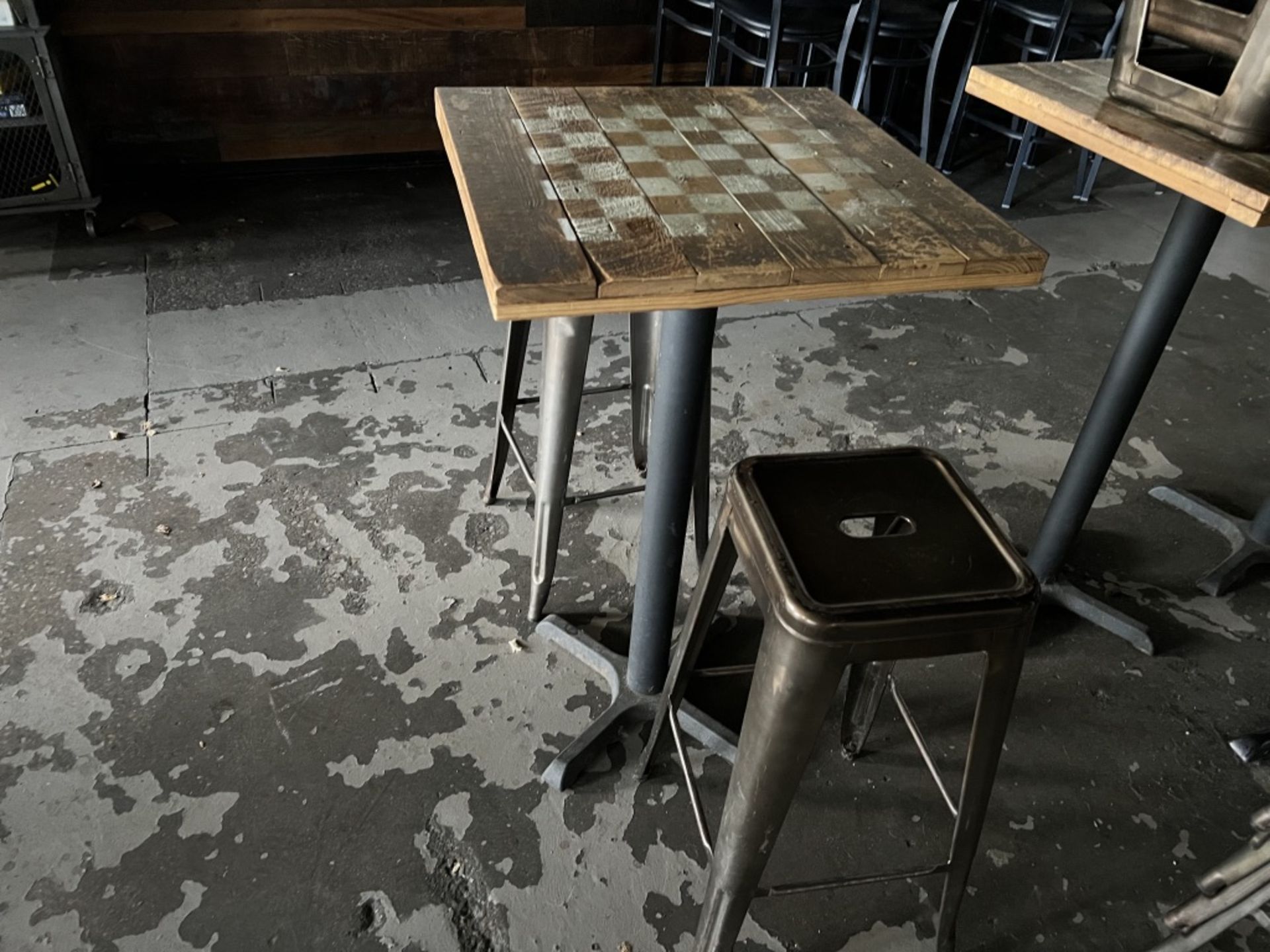 LOT OF: (1) 24" X 24" HI-TOP SQUARE TABLE WITH CHESS/CHECKERS LAYOUT AND (2) METAL STOOLS