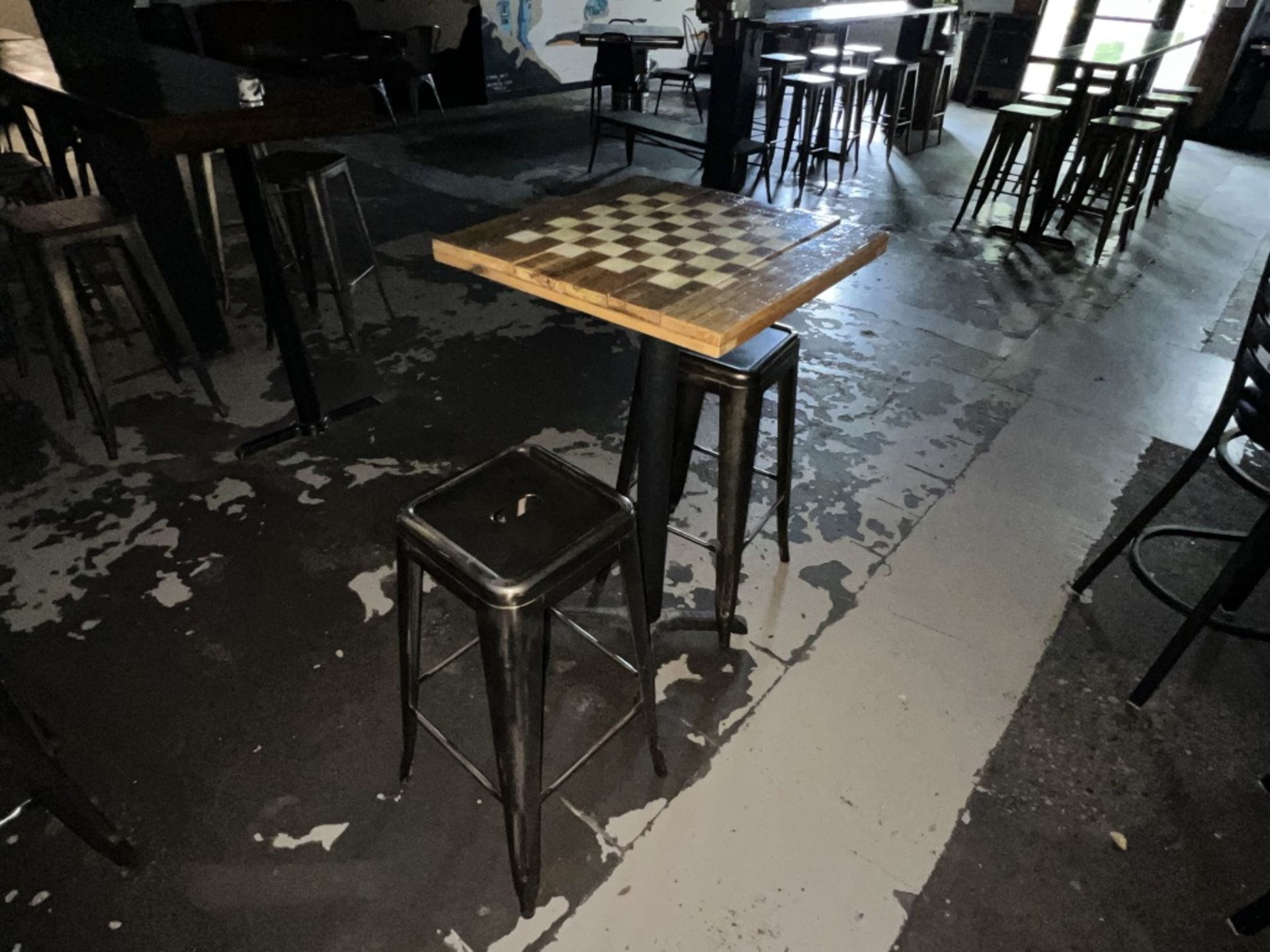 LOT OF: (1) 24" X 24" HI-TOP SQUARE TABLE WITH CHESS/CHECKERS LAYOUT AND (2) METAL STOOLS - Image 2 of 2