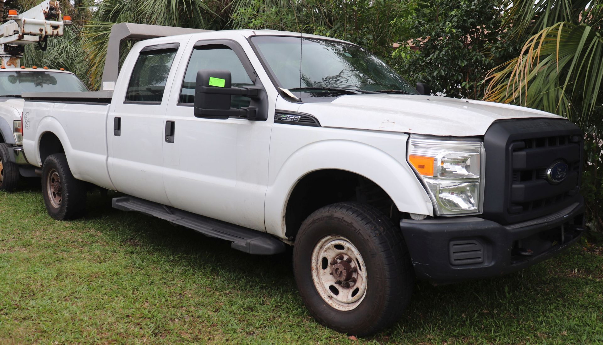 2013 Ford F-350 pickup, 200520 miles, with powered dump bed, Vin: 1FT8W3B68DEA11809