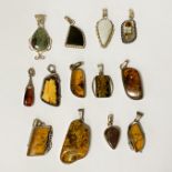 QUANTITY OF AMBER AND AGATE PENDANTS - SOME SILVER