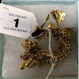 9CT GOLD CHARM BRACELET - APPROX 48.2 GRAMS