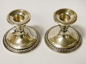 PAIR OF STERLING SILVER CANDLESTICKS - 8 CMS (H) APPROX