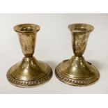 PAIR OF SMALL SILVER CANDLESTICKS - APPROX 10 CMS (H)