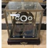 ROLLING BALL CONGREAVE CLOCK IN GLASS CASE - APPROX 41 CMS (H) INCLUDING CASE
