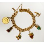 GOLD CHARM BRACELET 65 GRAMS APPROX - MIXED CARAT