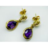 18CT YELLOW GOLD AND PURPLE STONE EARRINGS