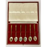 BOX OF FLORAL ENAMELLED SILVER SPOONS