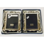 PAIR OF SILVER PHOTO FRAMES - BOXED 18CMS X 15CMS
