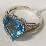 18 CT. WHITE GOLD DIAMOND & BLUE GEMSTONE HEART SHAPED RING - SIZE L - M