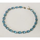 9 CT. GOLD BLUE GEMSTONE BRACELET