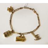 9CT GOLD CHARM BRACELET 26.4 GRAMS