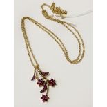 9CT GOLD - RUBY PENDANT WITH CHAIN