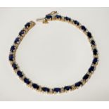 9 CT. GOLD BLUE SAPPHIRE & DIAMOND BRACELET