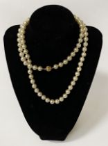 18 CARAT GOLD CLASPED PEARL NECKLACE 30'' LENGTH