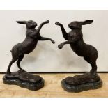 PAIR OF BRONZE BOXING HARES 30CMS (H) APPROX