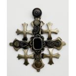 A LARGE SILVER CROSS PENDANT WITH STONE IN THE MIDDLE SIGNED BETHLEHEM