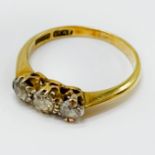 18CT GOLD THREE-STONE DIAMOND RING