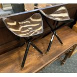 PAIR OF SADDLE STOOLS