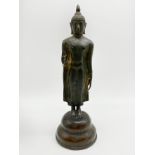 BRONZE STANDING SIAMESE BUDDHA IN STYLEE OF CHIENGSEN PERIOD (13TH CENTURY A.D.)