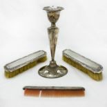 HALLMARKED SILVER CANDLESTICK AND THREE-PIECE BRUSH SET