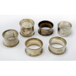 FIVE HALLMARKED SILVER NAPKIN RINGS