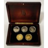FIVE CASED SILVER COLLECTORS COINS - 5OZ APPROX
