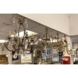 FOUR BRASS CHANDELIERS