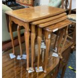 WALNUT NEST OF FOUR TABLES