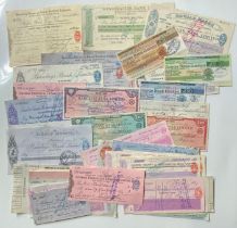 CHEQUES, ASSORTED BRITISH BANKS, INC. SOME TRAVELLERS CHEQUES (53). ALL USED