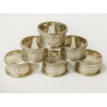 SIX STERLING SILVER NAPKIN RINGS - NUMBERED 4OZS APPROX