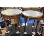 TWO CIRCULAR MARBLE TOPPED TABLES ON FLUTED LEGS A/F