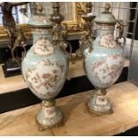 PAIR LARGE BRONZE & PORCELAIN CHERUB VASES 50CMS (H)