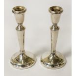 PAIR OF SILVER WEIGHTED CANDLESTICKS 19CM (H)