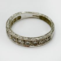 18CT WHITE GOLD HALF ETERNITY RING SIZE R/S - 4.8 GRAMS APPROX INC. STONES