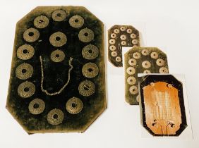 DISPLAY OF TIBETAN BROOCHES COLLECTED IN THE 19THC