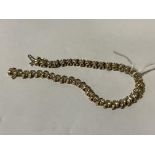 14 CARAT DIAMOND TENNIS BRACELET - 12.7 GRAMS APPROX