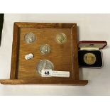 SILVER COMMEMORATIVE MEDALLIONS MOUNTED WITH ANOTHER