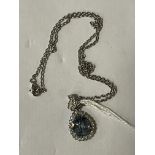 18CT WHITE GOLD DIAMOND & GEMSTONE PENDANT ON CHAIN (GEMSTONE TESTS AS POSSIBLY SAPPHIRE)