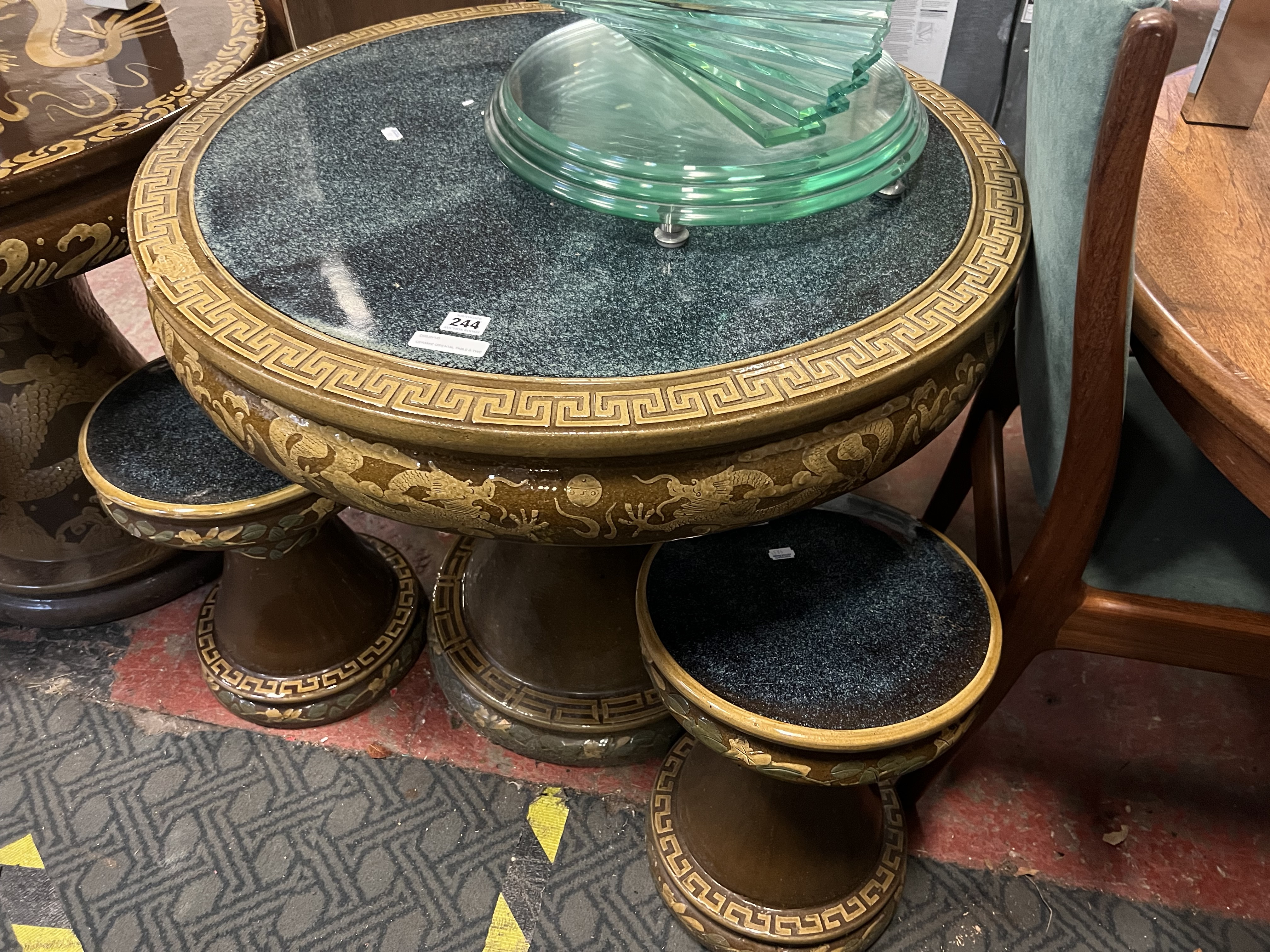 CERAMIC ORIENTAL TABLE & TWO STOOLS - DAMAGED