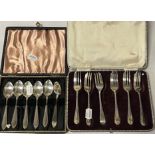 SET OF SIX HM SILVER TEASPOONS & A SET OF 6 HM SILVER DESERT SPOONS, BOTH BOXED