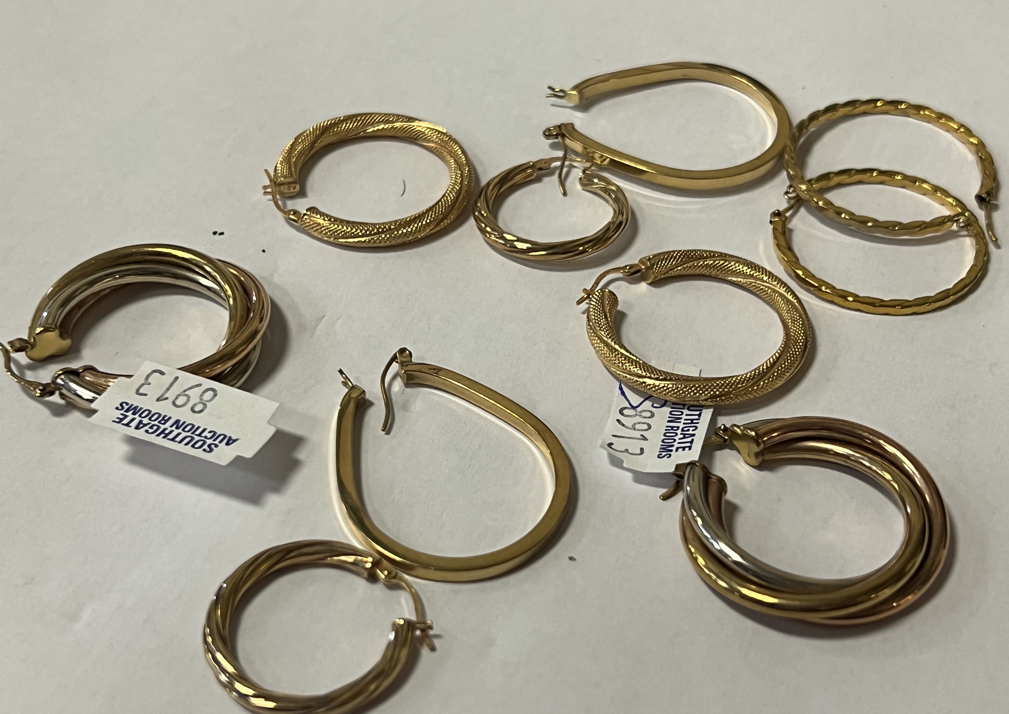 FIVE PAIRS OF 9CT GOLD HOOP EARRINGS