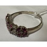 10CT WHITE GOLD, DIAMOND & RUBY RING SIZE S - 3 GRAMS APPROX