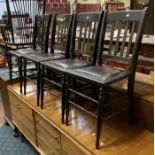 4 X BLACK WOODEN CHAIRS - MAKERS MARK GILBERT SWINDOM