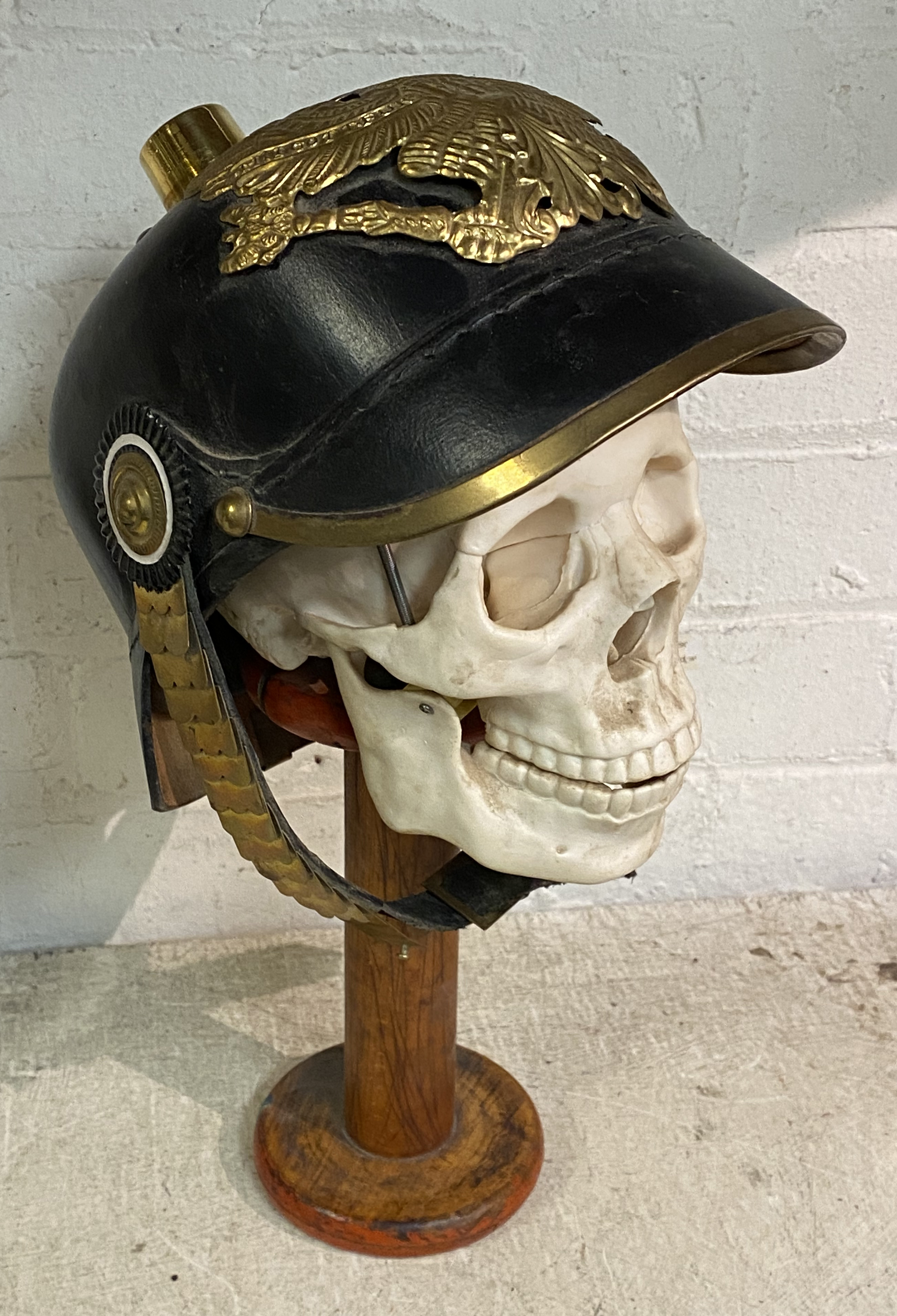 REPLICA SKULL WITH WW1 HELMET ON STAND