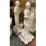 PAIR OF GARDEN PIPE PLAYING FIGURES