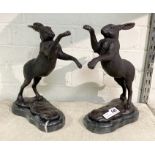 PAIR OF BRONZE BOXING HARES 29CMS (H) APPROX