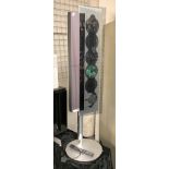 BANG & OLUFSEN FLOOR STANDING MULTICHANGER CD UNIT TOGETHER WITH A PAIR OF B & O SPEAKERS ON A BLACK